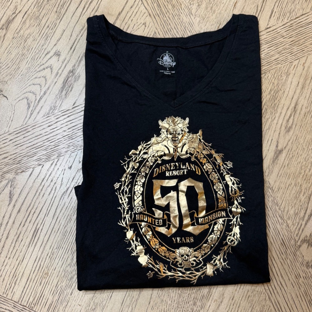 Disney Black V-Neck Tee with Metallic Gold Haunted Mansion 50th Emblem